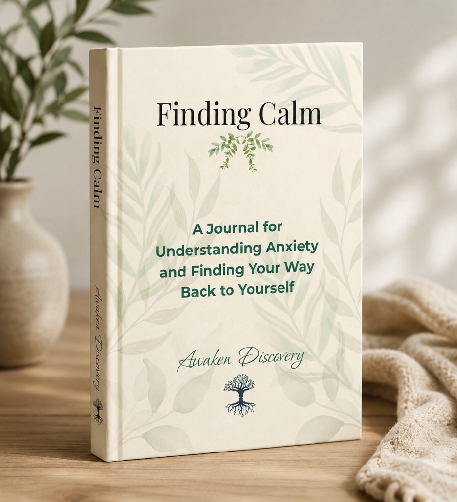 Closed 'Finding Calm' reflection journal standing on a wooden table